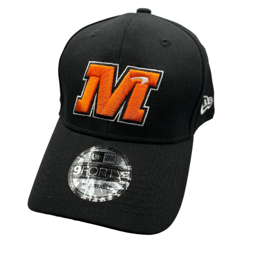 Official McLaren Formula 1 Team cap featuring papaya orange color, embroidered team logo, curved brim, and adjustable strap – ideal F1 merchandise for McLaren fans and motorsport collectors.