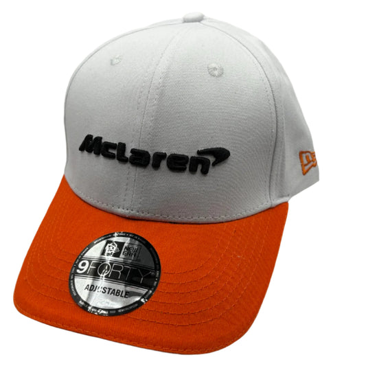 Official McLaren Formula 1 Team cap featuring papaya orange color, embroidered team logo, curved brim, and adjustable strap – ideal F1 merchandise for McLaren fans and motorsport collectors.