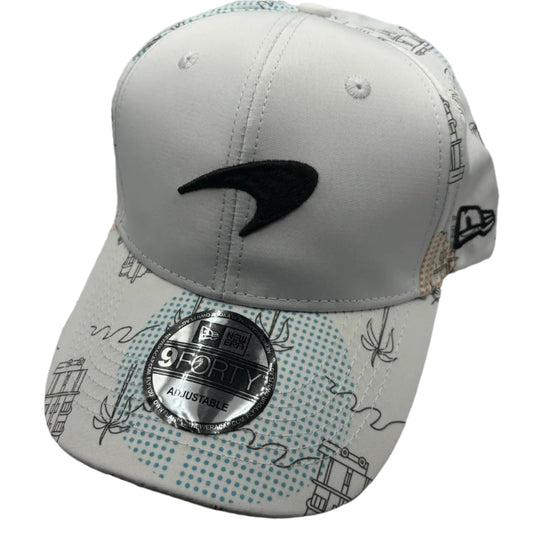 Official McLaren Formula 1 Team cap featuring papaya orange color, embroidered team logo, curved brim, and adjustable strap – ideal F1 merchandise for McLaren fans and motorsport collectors.