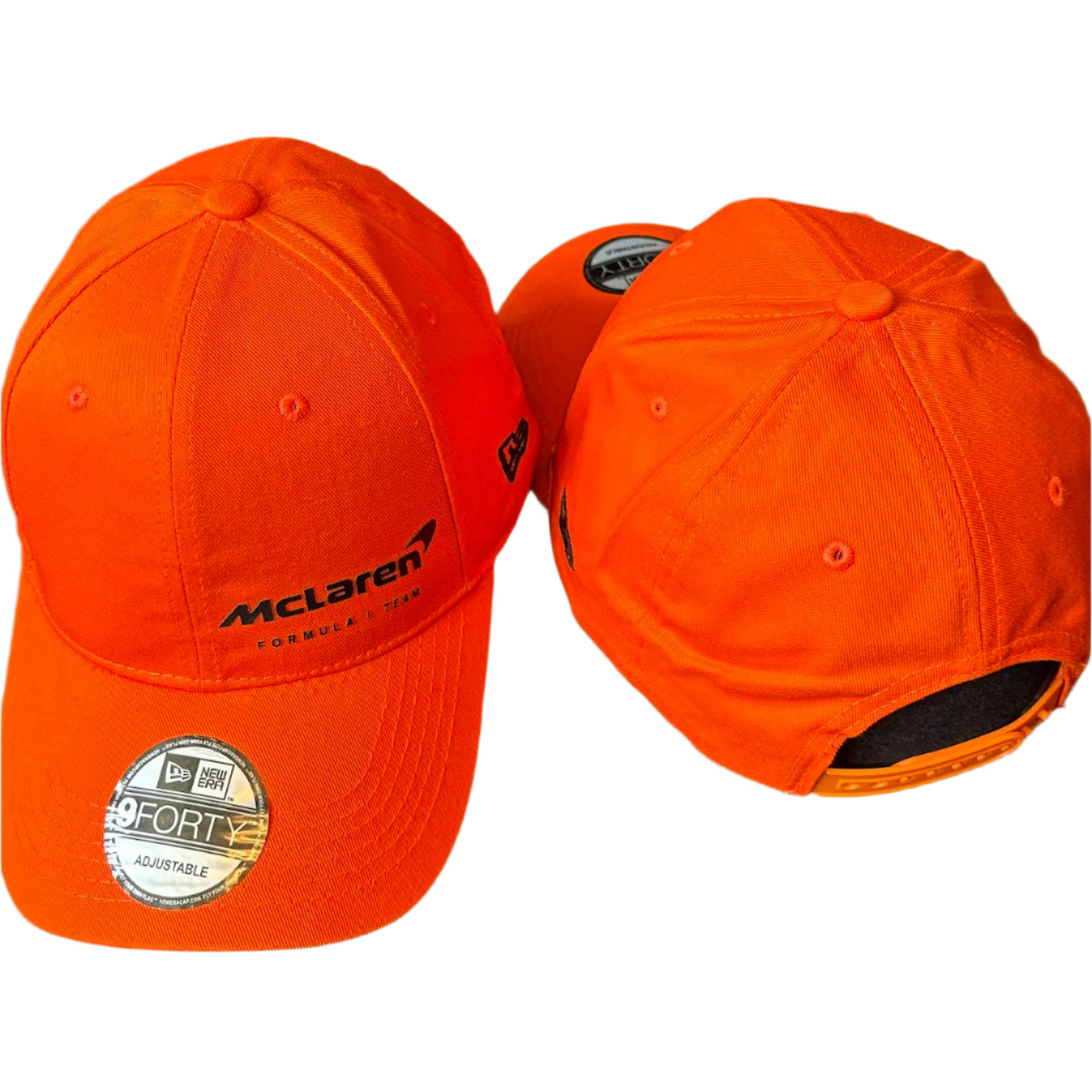 Official McLaren Formula 1 Team cap featuring papaya orange color, embroidered team logo, curved brim, and adjustable strap – ideal F1 merchandise for McLaren fans and motorsport collectors.