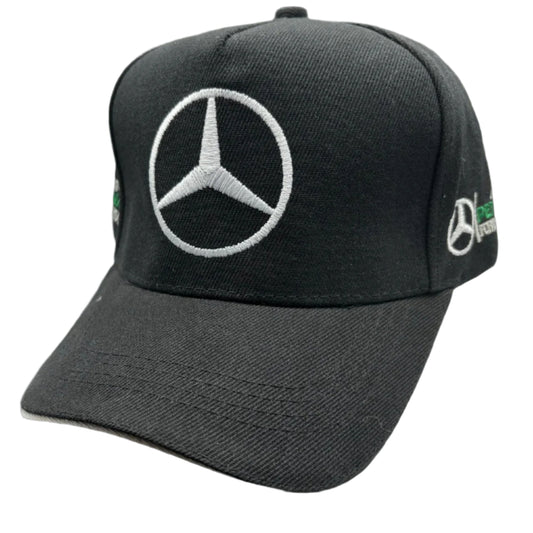 Official Mercedes-AMG Petronas Formula 1 Team hat featuring black cotton fabric, team logo on the front, adjustable strap, and Lewis Hamilton branding – perfect for F1 fans and motorsport enthusiasts.